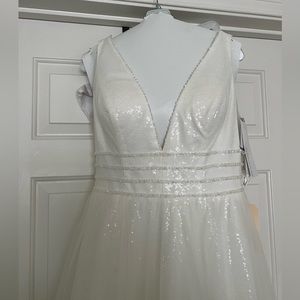 Wedding dress size 12, never worn